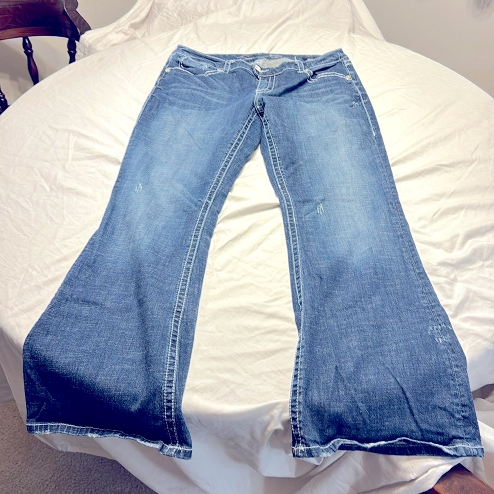 Seven7 flare jeans. Slightly distressed